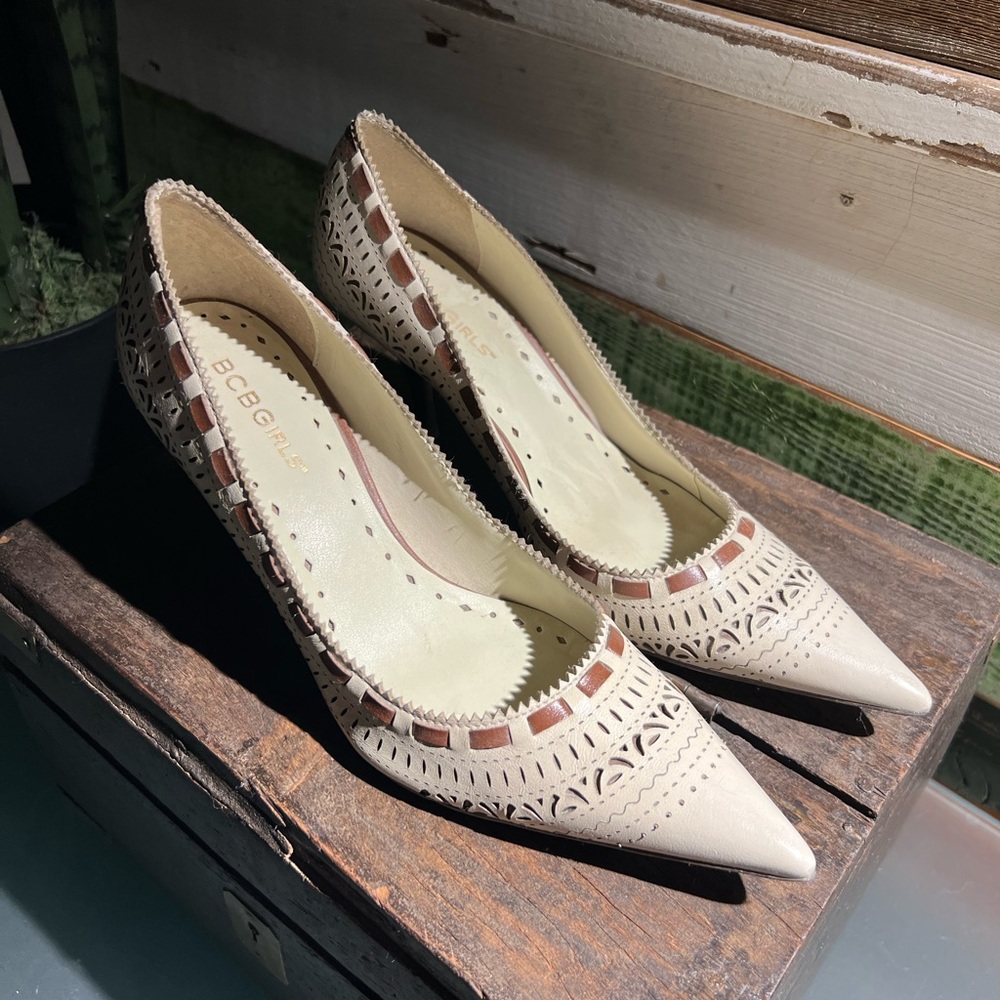BCBGirls cream and brown heel with cutouts. 6.5